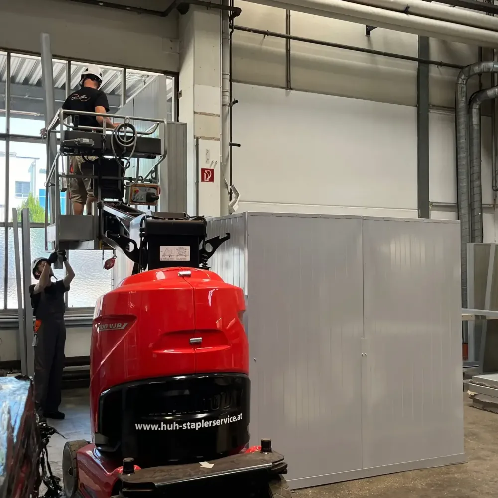 Soundproof enclosure in a railway tracks plant