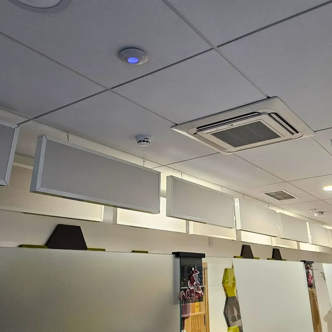 Acoustic improvement in high-traffic office reception